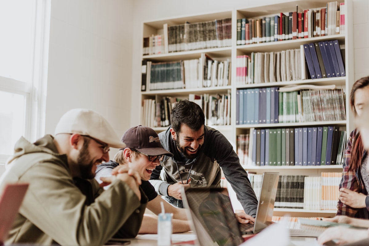 Students collaborating over academic data in a university library